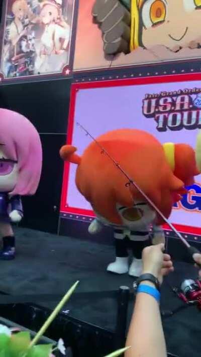 Fisherman Lancer attempts to capture a Gudako, using Saint Quartz as bait!