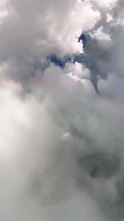 Skydiving into a 14,000 ft thunder cloud.