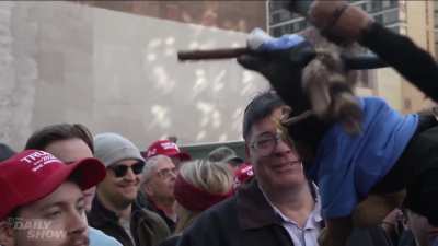 Triumph the Insult Comic Dog singing at Trump's MSG rally. 