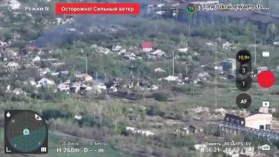 A Russian Tank disguised as a hut moves through no mans land in Krasnohorivka whilst evading Ukrainian fire 