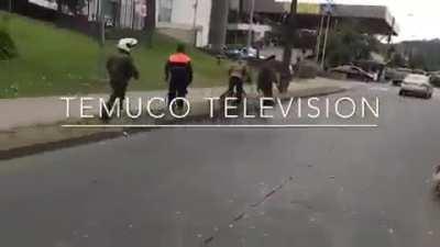 Mapuche people defending themselves against police brutality in Temuco, Chile