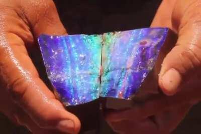 Splitting Open A Boulder Opal To See Its Beauty For The First Time