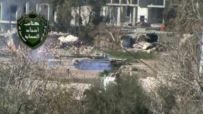 Ahfad Al-Sahaba Brigade anti-tank team hits an SAA T-72 reversing through Irbin, Damascus - 3/2/2013