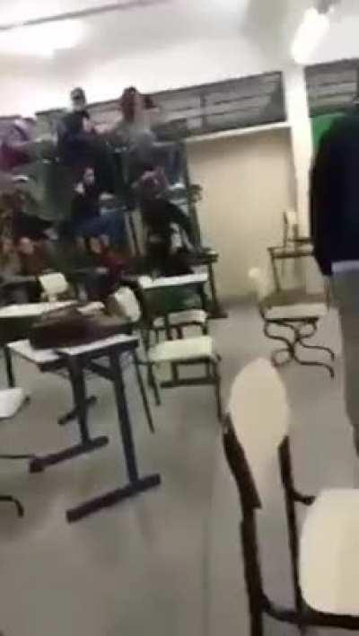 WCGW Stacking up chairs in a classroom