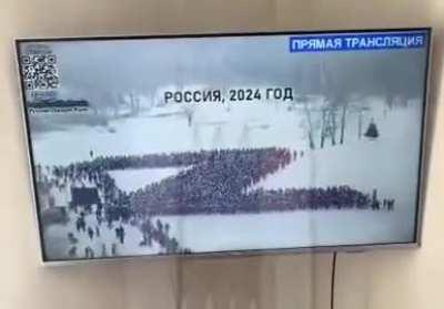 Hackers infiltrated the broadcast of the Kremlin military parade on Smart TVs nationwide, replacing it with the following footage