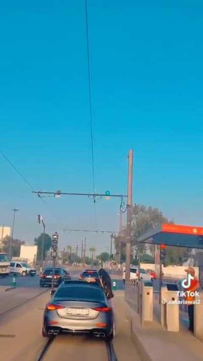 Family in Casablanca celebrate their wedding by driving on tramway track