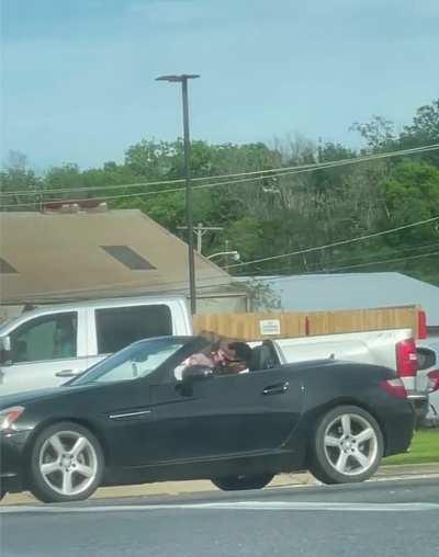 Guy with puppet at stoplight in Alexandria, La.