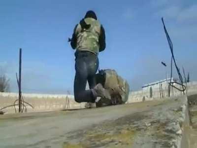 Farouq Brigade fighter is wound while exposing himself to fire on Syrian Army troops - Al-Qusayr - 2012