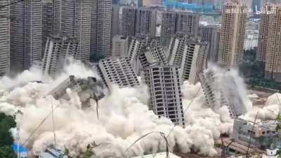 Blowing up 15 empty Condos at once due to abandoned housing development in China