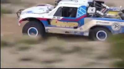 Heli video of Luke McMillin cruising in his Trophy Truck at the Silver State 300 in 2020. The trucks are designed for maximum suspension travel, most are able to travel as much as 36 to 40-inches and cost upwards of $250,000 to $500,000.