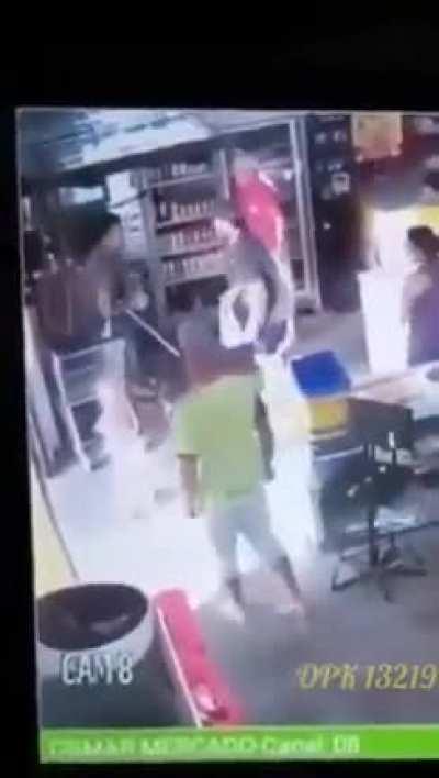 Man gets electrocuted while holding a child. Guy in the red shirt saves the day