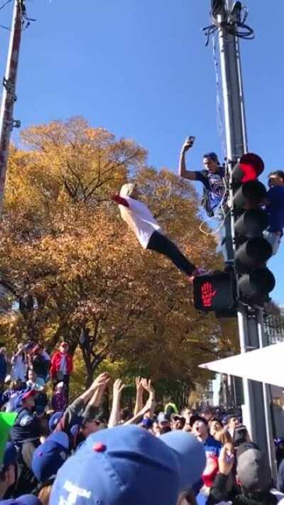 Standing on a traffic light