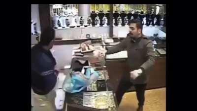 Robbery goes badly for the robber..