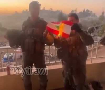 Israeli soldiers celebrating while burning our flag in southern lebanon