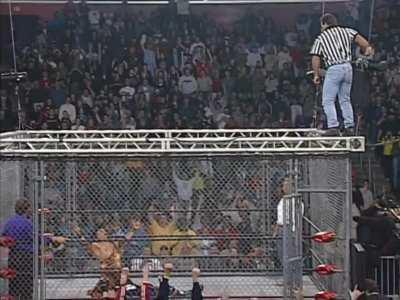 Chris Benoit and Jimmy &quot;Superfly&quot; Snuka from the top of the cage - WCW 2000