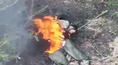 Russian Soldier Catches Alight - Aerial Drone Footage