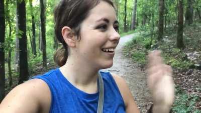 Girl makes friends on a nature walk