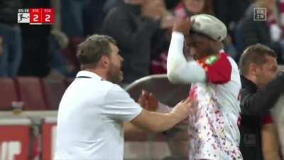 Anthony Modeste steals hat of his own coach while celebrating his late equaliser