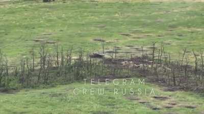 An attempted extraction of UA soldiers from a trench line goes wrong as the apc hits a mine driving through an open field. Footage posted June 22nd / Location unconfirmed