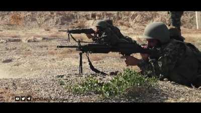 Taliban practising with LMG's and RPG's