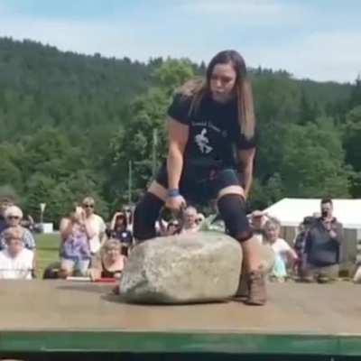 Leigh Holland-Keen lifting the legendary 733-pound Dinnie Stones, second woman ever to do so