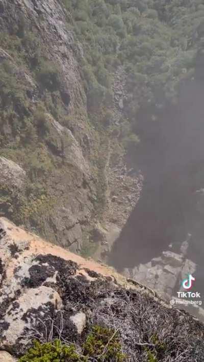 Safety worker clears loose boulders in Norway