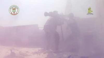 FSA fighter shoulders an SPG-9 and places a round through the window of an SAA occupied building - Aleppo - 7/19/2015