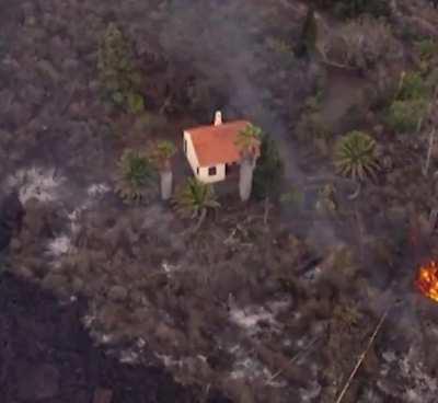 Miracle house spared from being scorched by La Palma lava.