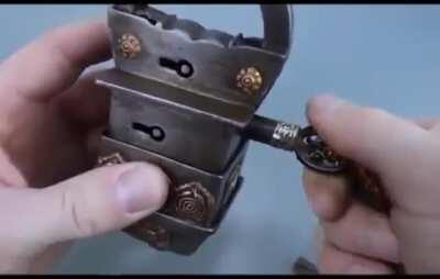 A Nepalese padlock requiring 4 keys.