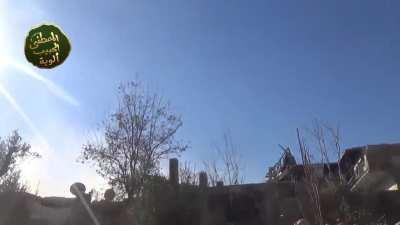 Opposition cameraman filming captures the moment a Syrian Army &quot;Elephant Rocket&quot; soars overhead - Jobar, Damascus - 12/25/2014