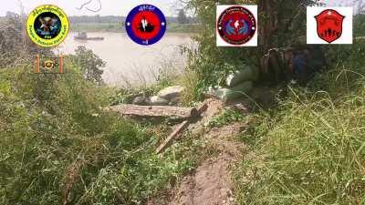 Anti-Junta Forces attacking a Myanmar Army boat convoy along the Chindwin River. This convoy was later captured.