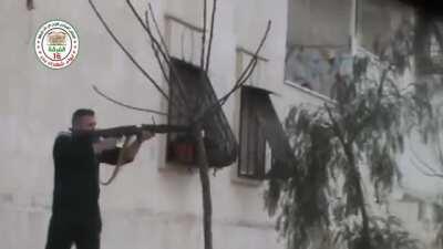 A FSA Division 16 rebel shoulder fires a MG3 (MG42 chambered for the 7.62×51mm NATO cartridge) at SAA forces. Aleppo 1/18/2014