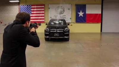 CEO of a bulletproof car company puts his money where his mouth is in a live test