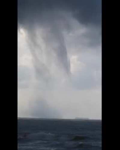 Man Captures Massive Multiple-Vortex Waterspout