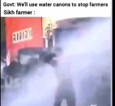 sikh farmer embracing hydro cannon