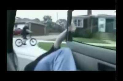 Hitting someone on a bike with a car door.