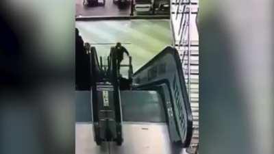 Small Girl Pushing Brother in Stroller Accidentally Fall Down Escalator