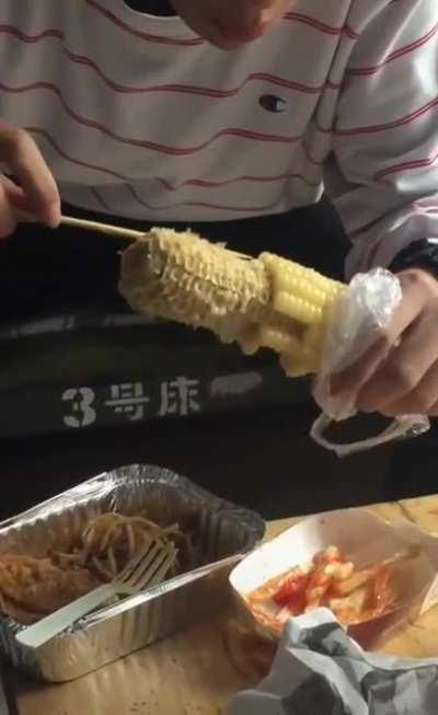 Eating corn in less messy way.