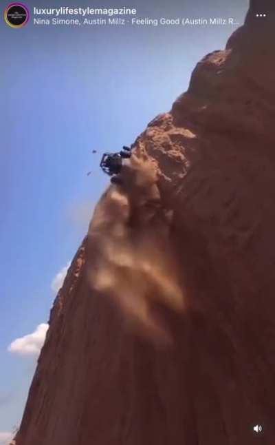 Dune buggy climbs an almost 90° hill