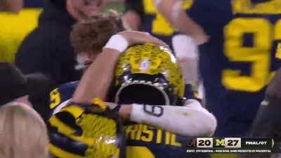Michigan stops Alabama in OT to advance to the National Title game