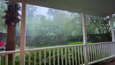 A welcome rain with a cool breeze in the summer heat. This front porch is my favorite place.