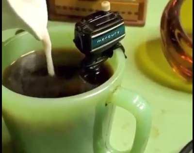A coffee stirring mini boat engine