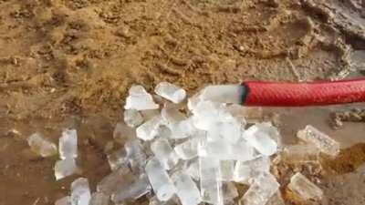 Frozen hose pooping out ice cubes.....