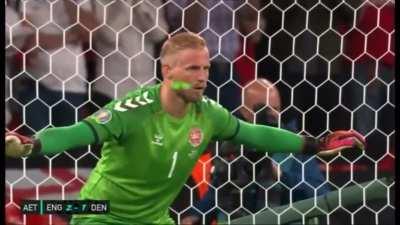 Fan tries distracting Danish goalkeeper by pointing a laser at his face, still saves penalty kick