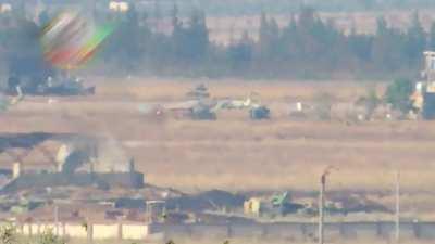 Liwa al-Tawhid ATGM team engages a tank defending an SAA held airport - Aleppo - 6/23/2013