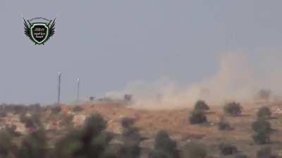 Black Shield Brigade ATGM team successfully targets a Syrian Army BMP during fighting for Daraa Central Prison - 2/22/2014