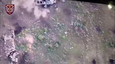 Russian soldier trying to defend a Ukrainian assault gets hit by a drone-dropped grenade. Bakhmut axis. September 2023.