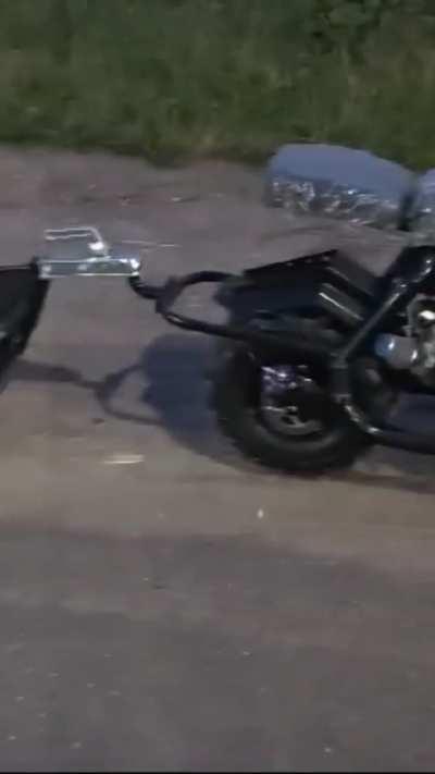 A russian citizen is happy about the motorcycle and trailer that he built to be used in Ukrainian assaults, not realizing that he built a death trap