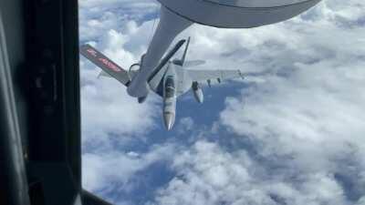 Friend of mine flies an aerial refueling plane. He asked if the fighter pilot would do something cool