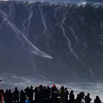 Sebastian Steudtner, a German pro surfer, rode a wave over 115 feet tall at Nazare, Portugal, a record breaking surf